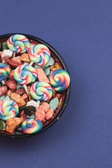 Lollipops and candies. candy bowl with sweets in the form of colored stones