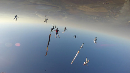 Friendship. Skydiving brings together friends. Team of paratroopers. Professionals in the sky.