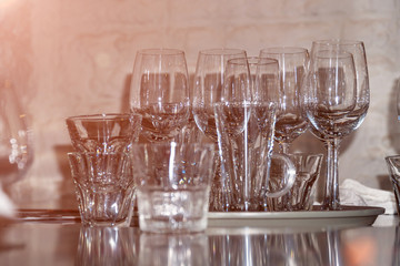 Many of Clean empty wine glasses on the table