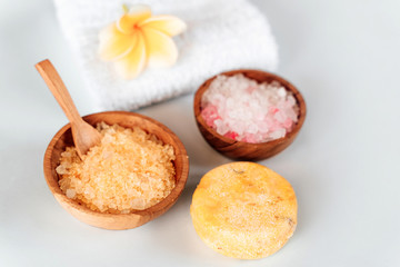Flatlay composition with bowl of bath salt and organic soap. Spa and Beauty treatment. Zero waste, organic cosmetics concept.