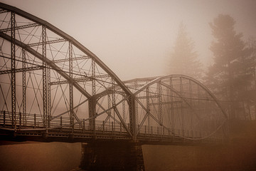 Historic Ouaquaga Bridge, on a foggy morning, as it crosses the Susquehanna River in Upstate NY