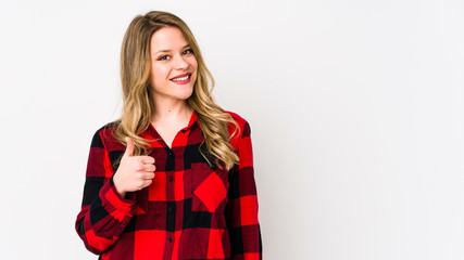 Young cauciasian woman isolated on white background smiling and raising thumb up