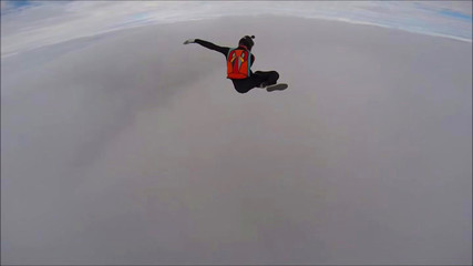 Fototapeta premium Planet. Skydiver travels around the world. There are no rules for brave people. The sky without borders.