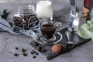 Obraz na płótnie Canvas Photo of coffee with milk and homemade cookies. Espresso coffee. Dark background. Image.