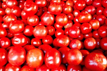 Stall with tomatoes at street market
