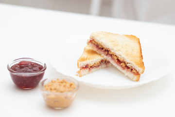 Sandwich with jam and peanut butter, delicious breakfast