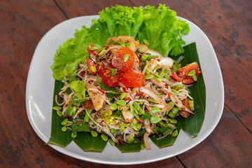 Rice noodle spicy salad with salted egg