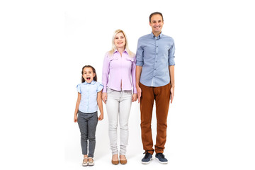 Fototapeta premium family and people concept - happy smiling mother, father and little daughter over white background