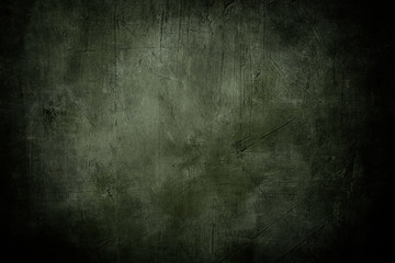 grunge green background or texture with dark vignette borders