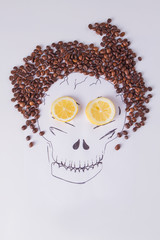 Still life with skull and coffee beans. Composition made with hand drawn skull, coffee beans and...