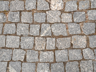 Old paving stones closeup, background, texture.