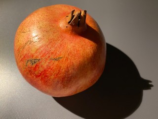 pomegranate isolated on gray background