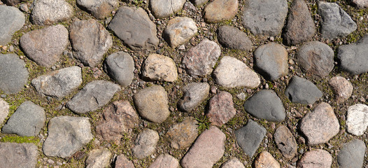 Old paving stones closeup, background, texture.