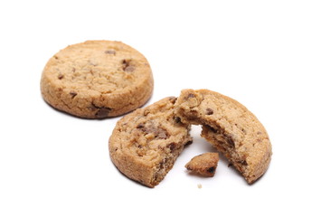 Round broken wholewheat biscuit with chocolate isolated on white background