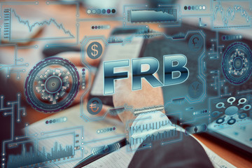A young businessman uses a futuristic smartphone with the latest holographic technology augmented...
