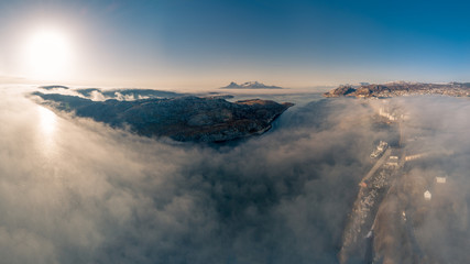 A great view of Bodø city as seen from above the clouds.