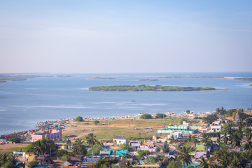 Naklejka na ściany i meble Breathtaking view of Pulicat(also called as Pazhaverkadu) Lagoon, Tamil Nadu, India. Aerial view of Pulicat lake and lagoon with fishing boats stationed around. Pulicat lake is in north of Chennai.