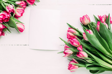Spring Bouquet of pink peony tulips on a white background with space for text.