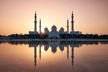 Foto op Canvas Abu Dhabi bij zonsondergang © Chalabala