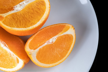Ripe orange isolated on black background Clipping Path