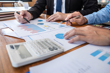 Group of Business team conference on meeting presentation to planning investment project working and strategy of business making conversation with partner, financial and accounting concept