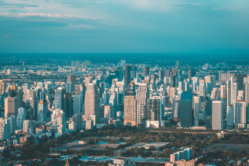 Fototapeta premium Vew of Bangkok skyline and skyscraper seen from Mahanakhon Tower Famous skyscrapers in day time