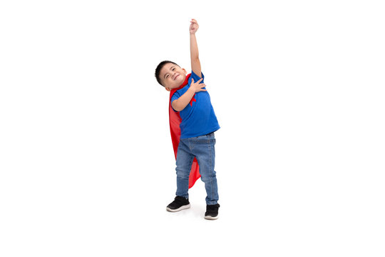 Asian boy with funny little power of hero isolated on white background, Superhero concept