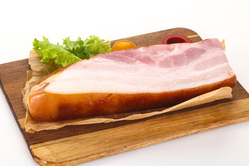 Smoked pork breast with salad leaves