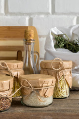 Vegetables and groceries in the kitchen. Storage in ecological friendly dishes, concept of zero waste and no plastic