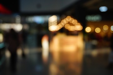 Blurred background. Shopping center gallery.