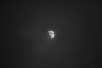 Moon seen through thin clouds