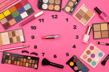 Creative clock made of make up and cosmetics products with lipstick clock wise 