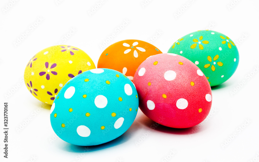 Wall mural Colorful handmade painted easter eggs isolated on a white