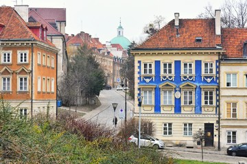 Warsaw, Poland - January 2020. Beautiful multi-colored houses in the old town in Warsaw.  The central streets of the historic center of Warsaw. The main tourist attraction of Warsaw. Cityscape 