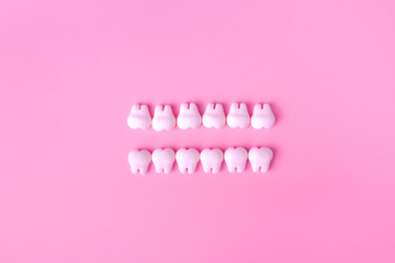 Dental background with models of teeth in two lines
