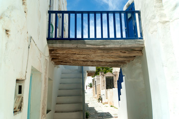 The historic Venetian Kastro in the old town at the beautiful Greek island of Folegandros.  A weathered balcony in a narrow alley.  The Kastro was designed as a place for defence and to live. 
