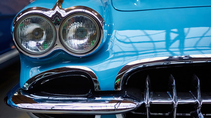 Fototapeta premium Detail of classic car. Close-up of headlight.