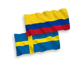 Flags of Sweden and Colombia on a white background