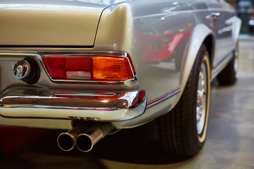Obraz na płótnie Canvas Closeup of the tail lights of a classic
