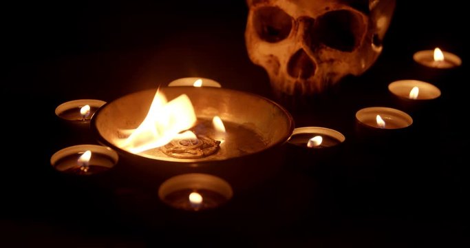 Burning pentacle on altar closeup footage