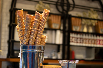 Close-up photo of cones in front of the ice cream shop.