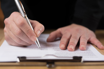 Sign a business contract. Close up. Lifestyle