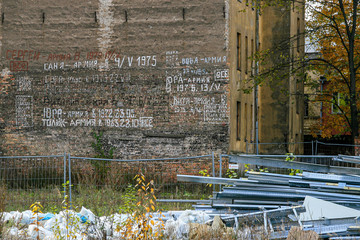 Riga, October, 2007, Old soviet graffiti on a brick facade in Riga