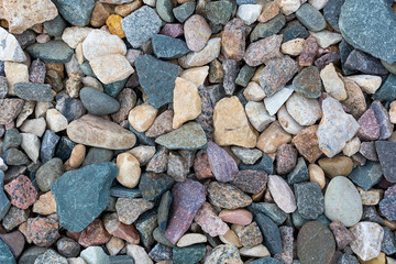 Multi-colored gravel for background. Abstract background and texture for design and project.