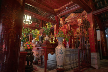 Fototapeta na wymiar Interior altar of the Temple of Literature in Hanoi, Vietnam, featuring Chinese philosopher Confucius.