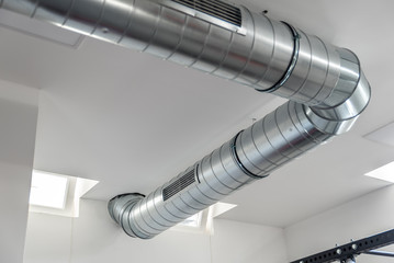 Vent system for indoor ventilation with metallic aluminum pipe and openings with grill for air...