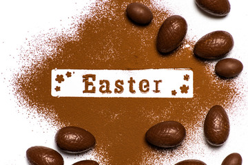 Easter background card with chocolate eggs