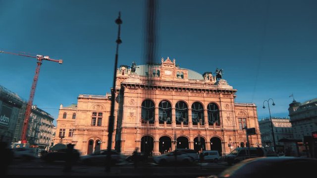 Vienna State Opera hyperlapse, busy street traffic, tourist attraction, Austria