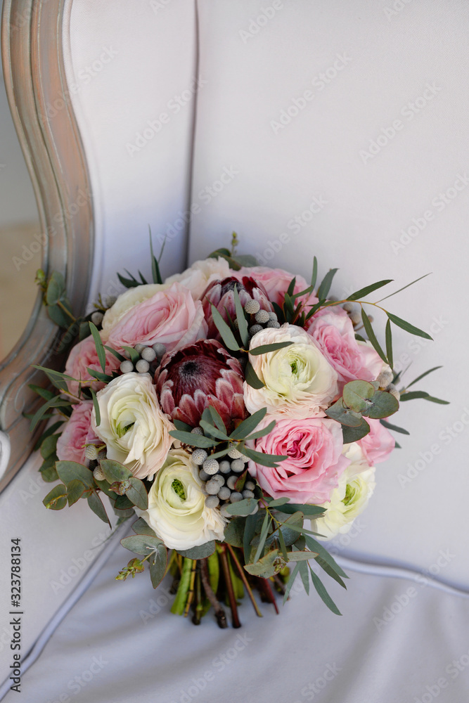 Poster Wedding flowers, bridal bouquet closeup. Decoration made of roses, peonies and decorative plants, close-up, selective focus, nobody, objects