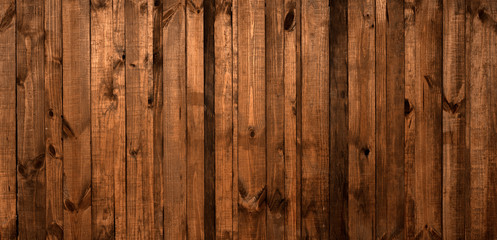 Old brown wooden plank . dark wood background.